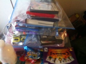 All of our things that keep us occupied in our room.  Wiped down, bagged, and will be wiped down before entering the room. 